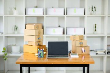 Naklejka premium Equipments for SME online business , delivery business laptop, barcode, boxes, checking product on stocks or parcels. Small business working at home office.