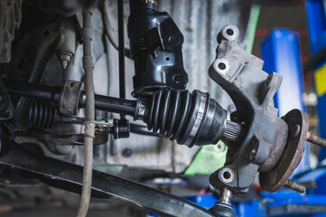 CV Axle Joint and CV boots replacement in garage services. - obrazy, fototapety, plakaty