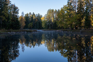 Fototapeta na wymiar Swedish river and natural salomon area in autumn. Farnebofjarden national park.