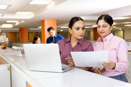 Creative businesswomen working as a team in a modern workplace