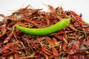 dried red pepper and one fresh green