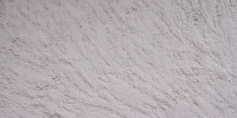 white crack old roughcast facade wall concrete wall background blank in header web panoramic