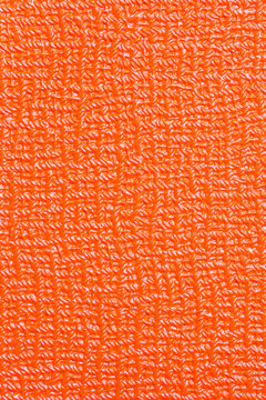 orange background material tolex closeup