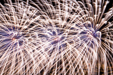 Close-up of colorful fireworks on black background