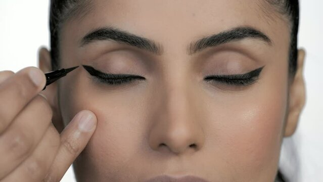 Pakistani Model Having Eye Liner Applied By Makeup Artist