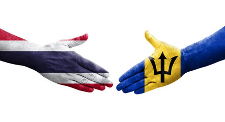 Handshake between Barbados and Thailand flags painted on hands, isolated transparent image.