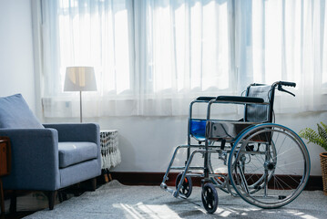 Empty wheelchair parked in nursing home. for senior or disabled assistance in living room at home.