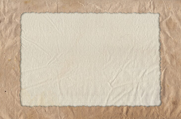 Old rough paper texture with rustic canvas textile background