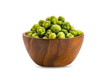 View of dry crispy wasabi coated green peas in wooden bowl.