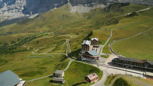 Aerial reveal of mount Eiger and Monch over Kleine Scheidegg, Switzerland