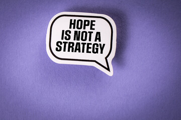 Hope is Not a Strategy. Speech bubble with text on purple background