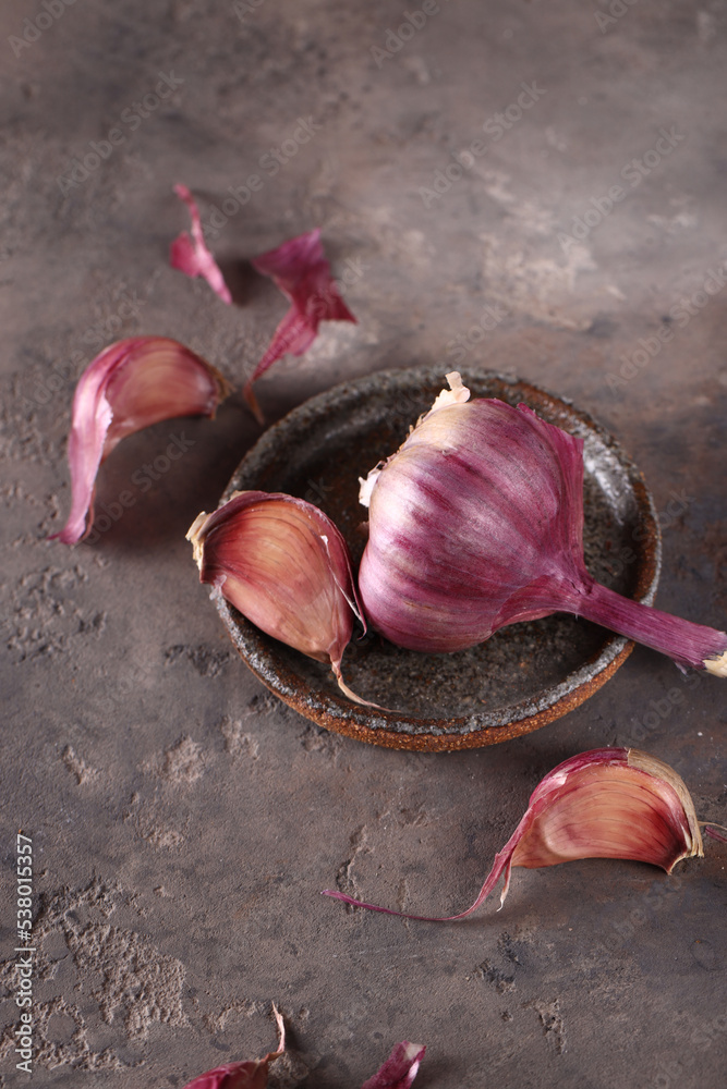 Poster ripe garlic healthy food on the table