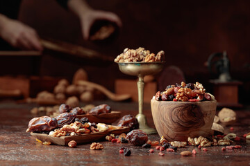 Various dried fruits and nuts on a kitchen table.