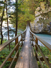 wooden bridge over Savinja river - along road between Luce and Solcava in Slovenia