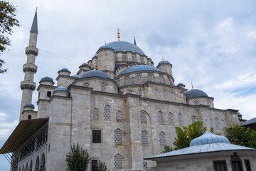 The New Mosque and later New Valide Sultan Mosque photo on a cloudy day. Selective focus