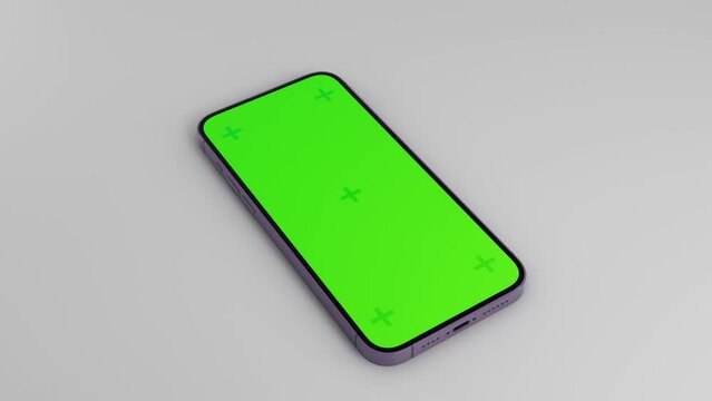 Realistic 3D CG latest new phone mockup with green screen tracking display key markers in slow angle camera movement. Device 14 laying on a simple clear white plane. chroma screen, keying technology 