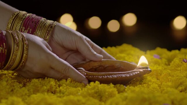 Clay diya lamps lit during diwali celebration, Diwali, or Deepavali, is a festival of lights and is one of the major festivals celebrated by Hindus, Jains, and Sikhs.