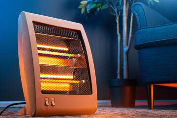 Modern electric infrared heater in the living room