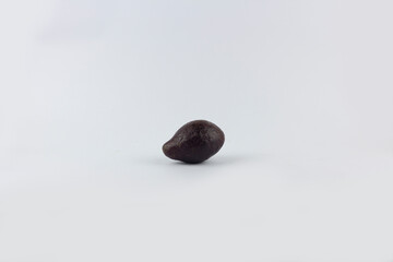 Brown ripe avocado isolated at white background