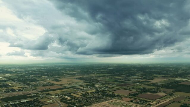drone hyperlapse timelapse footage day cloudy raining cloud storm over countryside edinburg texas