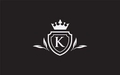 Obraz premium Crown and shield icon and royal luxury symbol image. King and queen abstract geometric logo with the letters