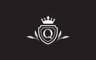 Fototapeta premium Crown and shield icon and royal luxury symbol image. King and queen abstract geometric logo with the letters