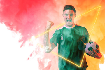 Male caucasian player holding ball and screaming with illuminated triangle over neon background