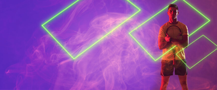 Caucasian male player holding tennis racket with illuminated rectangles against violet background