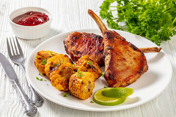 roast tomahawk pork chop with corn disks