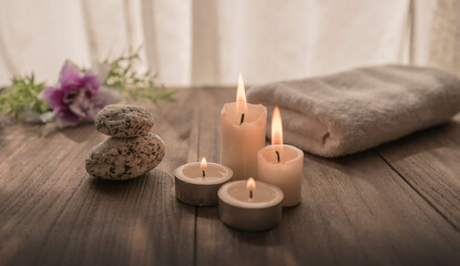 Obraz na płótnie Canvas spa decor with candles, towel, flowers. Spa decoration . 