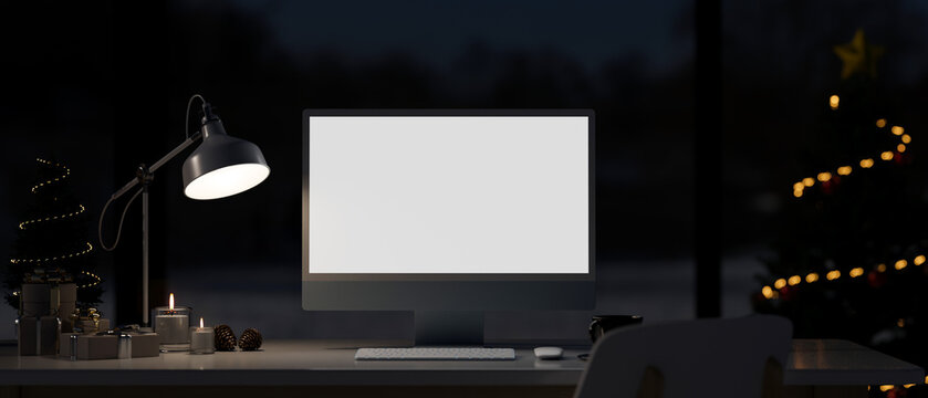 Modern dark office workspace with PC computer mockup, table lamp, Christmas tree and stuff