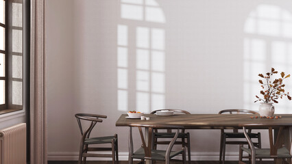 Farmhouse dining room with wooden table and chairs in dark and beige tones. Plaster walls, boho interior design