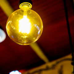 light bulb glass on red background