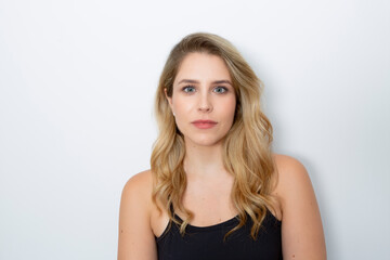 Obraz premium close-up of young blonde woman on white background