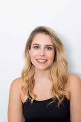 close-up of young blonde woman on white background