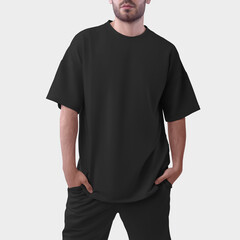 Mockup of an black oversized men's t-shirt for design, print, pattern. - obrazy, fototapety, plakaty