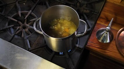 Stock pot on stove reducing
