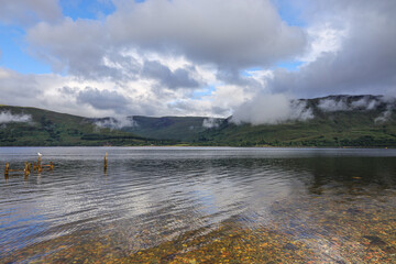 The scenic view of Loch Eil in Fort William, Scotland. Loch Eil (Scottish Gaelic, Loch Iall) is a sea loch in Lochaber, Scotland that opens into Loch Linnhe near the town of Fort William.