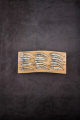 dried anchovy on dark background