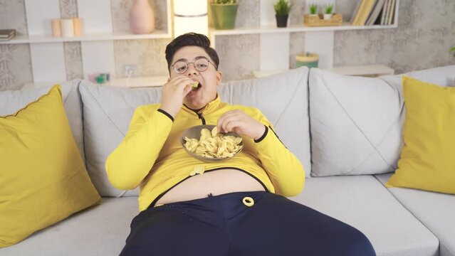 Child with obesity.
Child overeating at home.
