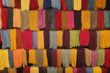 Cusco, Peru - 1 July, 2022: Andean textile weaving made with naturaly dyed Alpaca wool