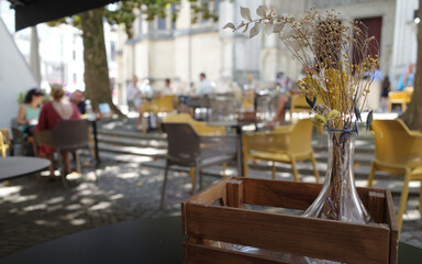 Bayonne, France - 20 July 2022: Cafe scene in the old town of Bayonne, Basque Country, France