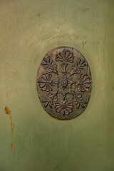 Oval Decorative Work on a Historic Door Leaf