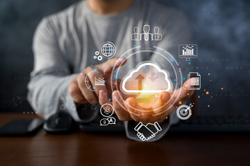 man use Laptop with cloud computing diagram show on hand. Cloud technology. Data storage.