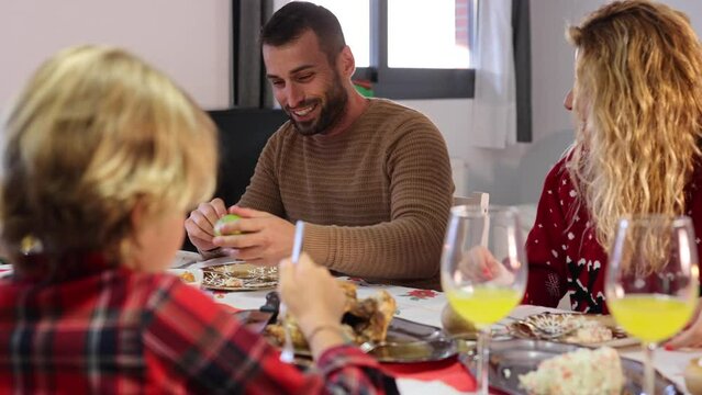 happy family christmas dinner, focus young father