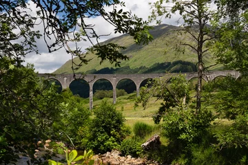 Papier Peint photo Viaduc de Glenfinnan The Glenfinnan Viaduct, is a railway on the West Highland Line located at the top of Loch Shield in the West Scottish Highlands
