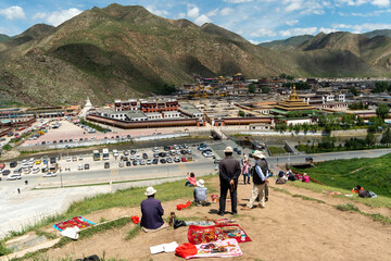 View over Labrang Temple, Xiahe, Gannan, Gansu, China with local sellers
