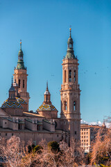 Fototapeta na wymiar Our Lady of the Pillar Roman Catholic church by the River Ebro in Zaragoza, Spain
