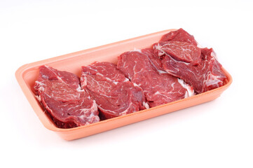 raw beef in plate package isolated
