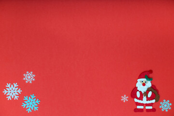 santa claus on red background with snowflakes.